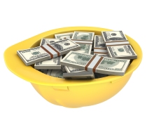 Yellow helmet full of dollars