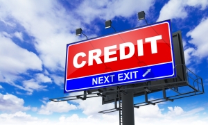 Credit Inscription on Red Billboard.