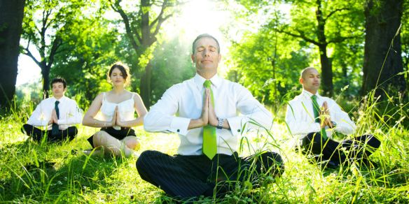 bigstock-Business-people-meditating-out-65025178