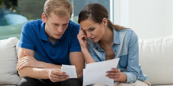 bigstock-Analyzing-Family-Budget-At-Hom-72844636