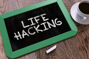 Hand Drawn Life Hacking Concept on Small Green Chalkboard. Business Background. Top View. 3D Render.