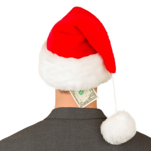 Business man with a santa hat isolated, santa's budget